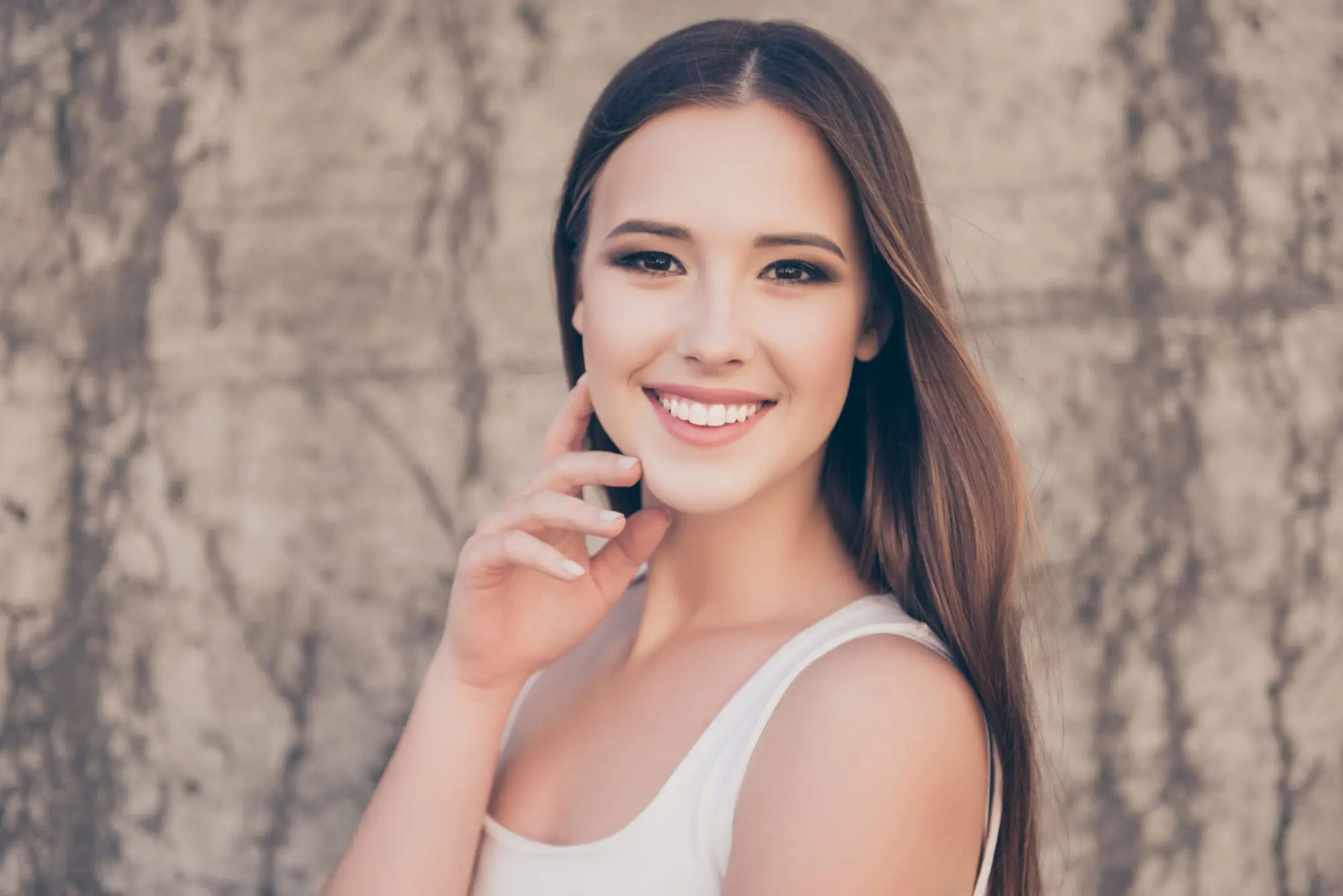 woman show smile with teeth treatment at NK Orthodontics