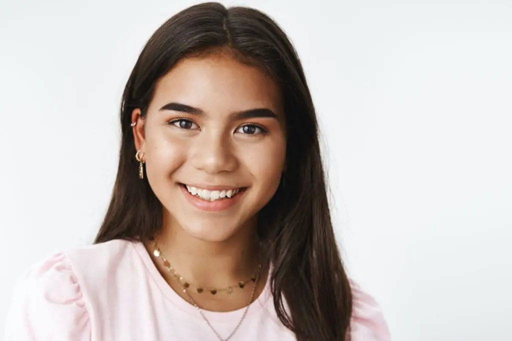 woman smile after treatment at NK Orthodontics in Johns Creek