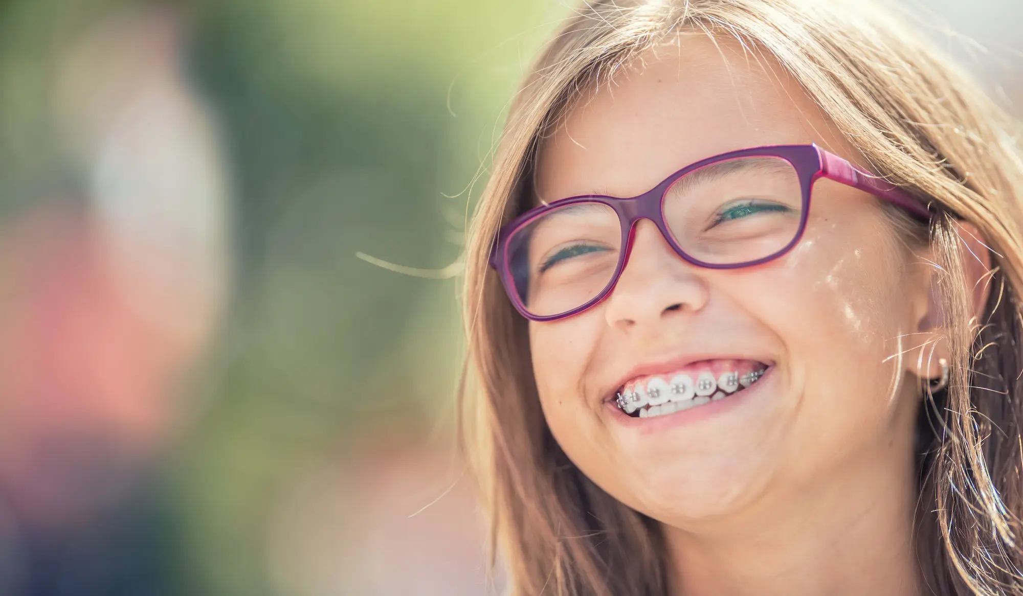 woman smile after treatment at NK Orthodontics in Lawrenceville